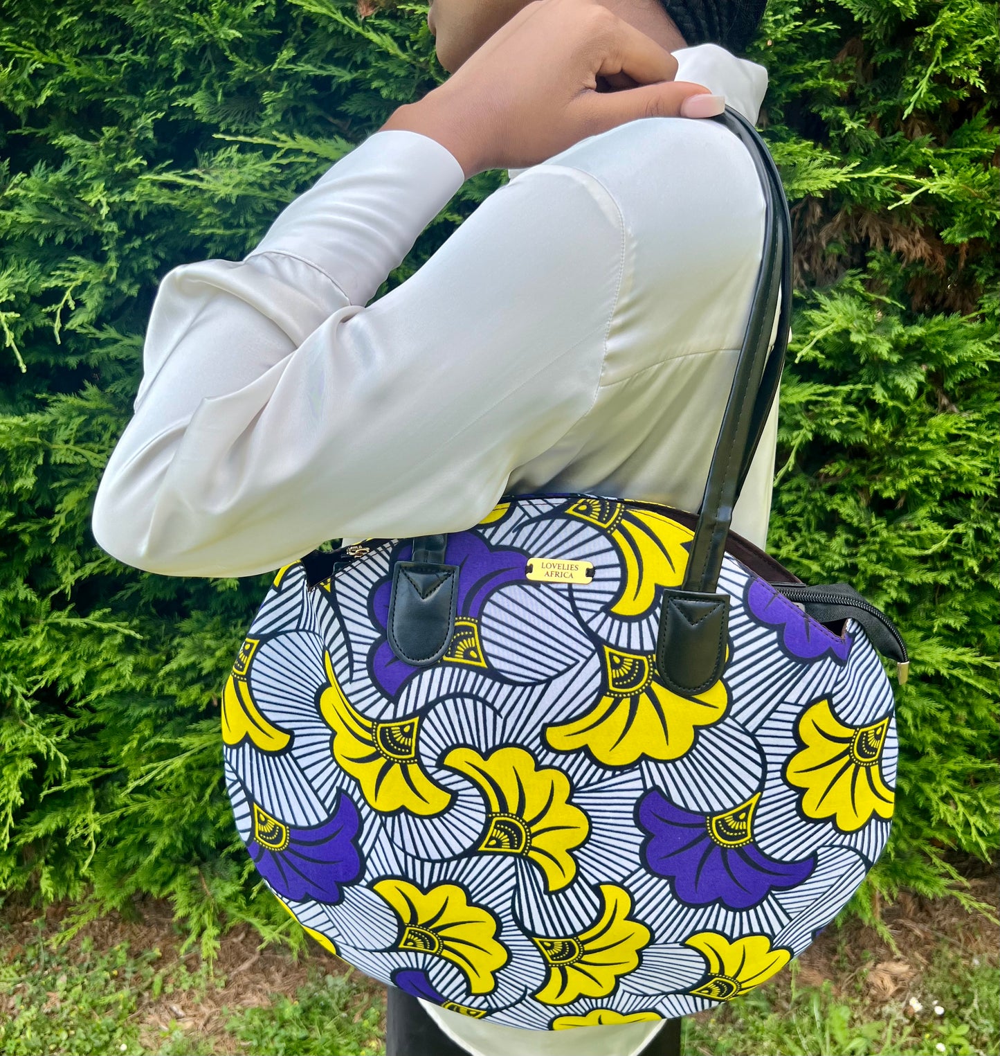 Round tote bag in mixed purple and yellow wax