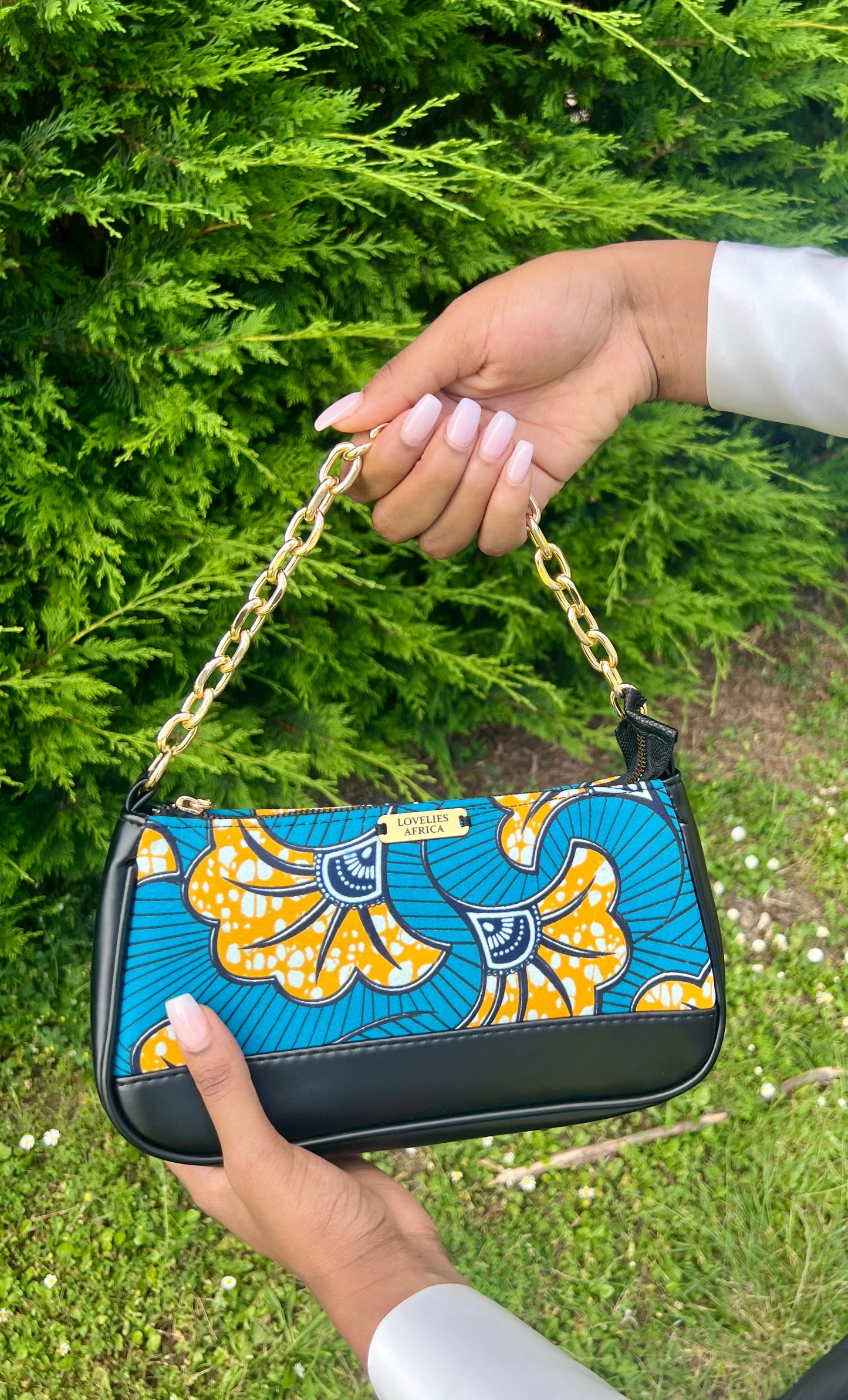 Turquoise and orange wax handbag/shoulder bag