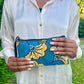 Pochette wax turquoise et orange